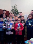 Діти отримали подарунки від Буринської районної державної адміністрації молоді та спорту за участь у конкурсі фотографії та малюнку "Милосердя"